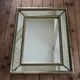 Miroir doré à parclose 68 X 54 cm