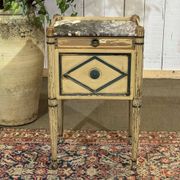 Beech bedside table painted with a marble top in Louis XVI style from the late 19th century.