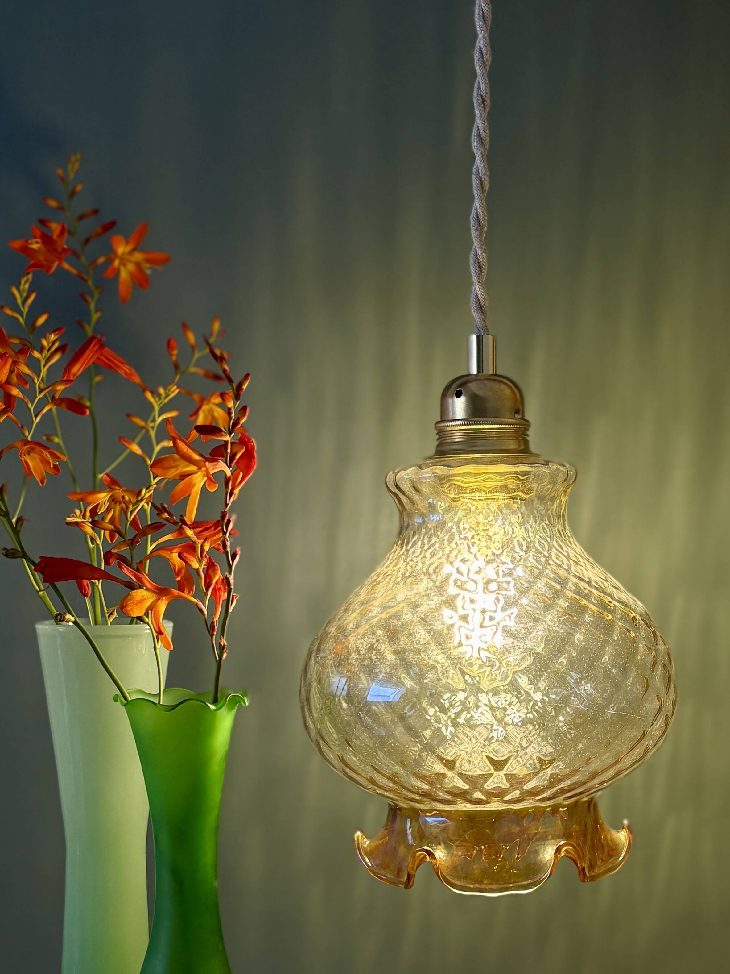 Vintage amber glass suspension globe