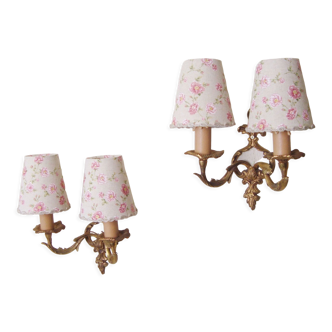 Pair of rocaille style sconces with four handmade pink fabric lampshades