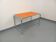 Vintage desk in orange faux leather and chrome from the 1970s.