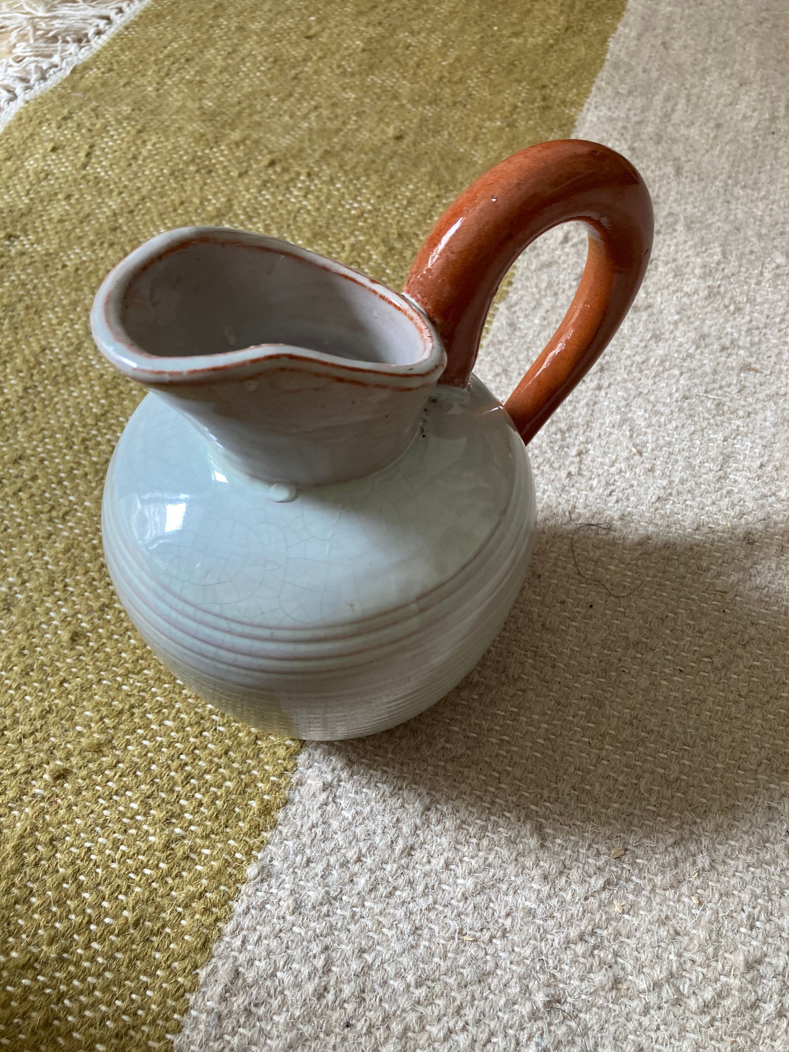 Small pitcher in sandstone