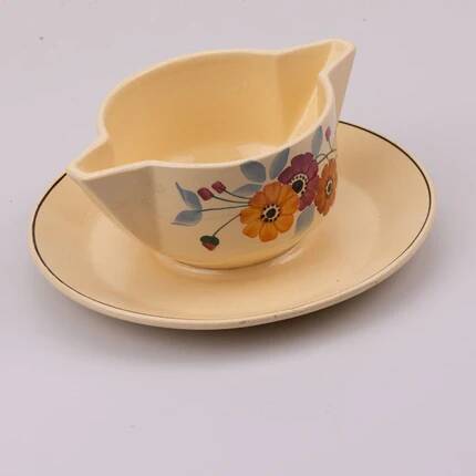 Saucière vintage en céramique Saint-Amand crème et à motifs fleuris