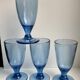 Set of 4 20s blue molded glass foot glasses