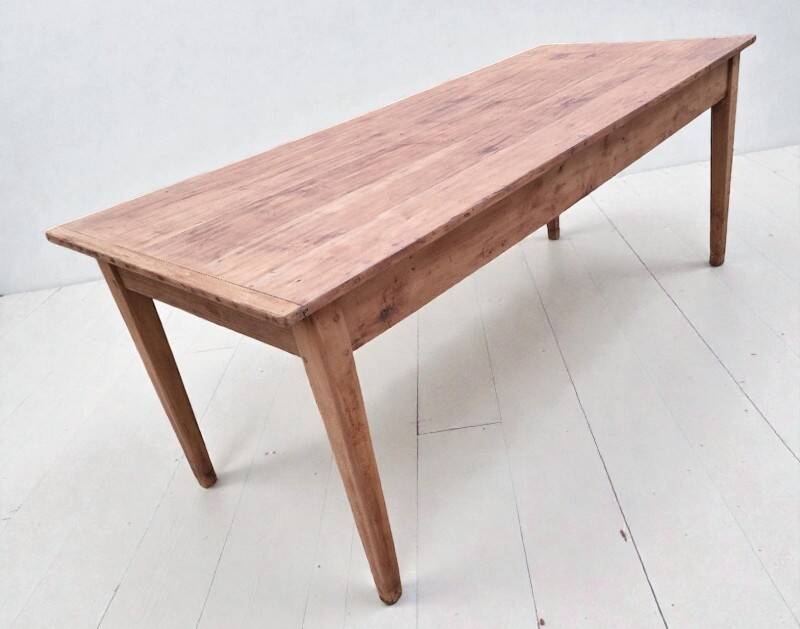 Old farmhouse table with two drawers.