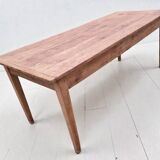 Old farmhouse table with two drawers.