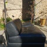 Paire de chauffeuses en cuir noir