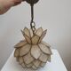 Suspension fleur de lotus en nacre et laiton