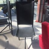 Set of 6 dining room chairs with tripod legs in grained leather and metal 1970