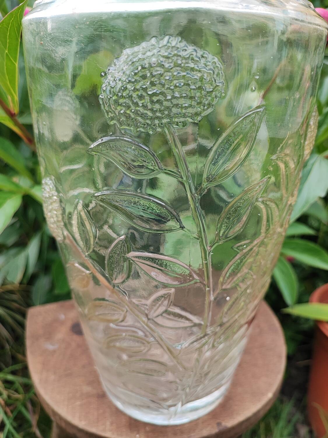 Old large molded glass vase with thistle decoration