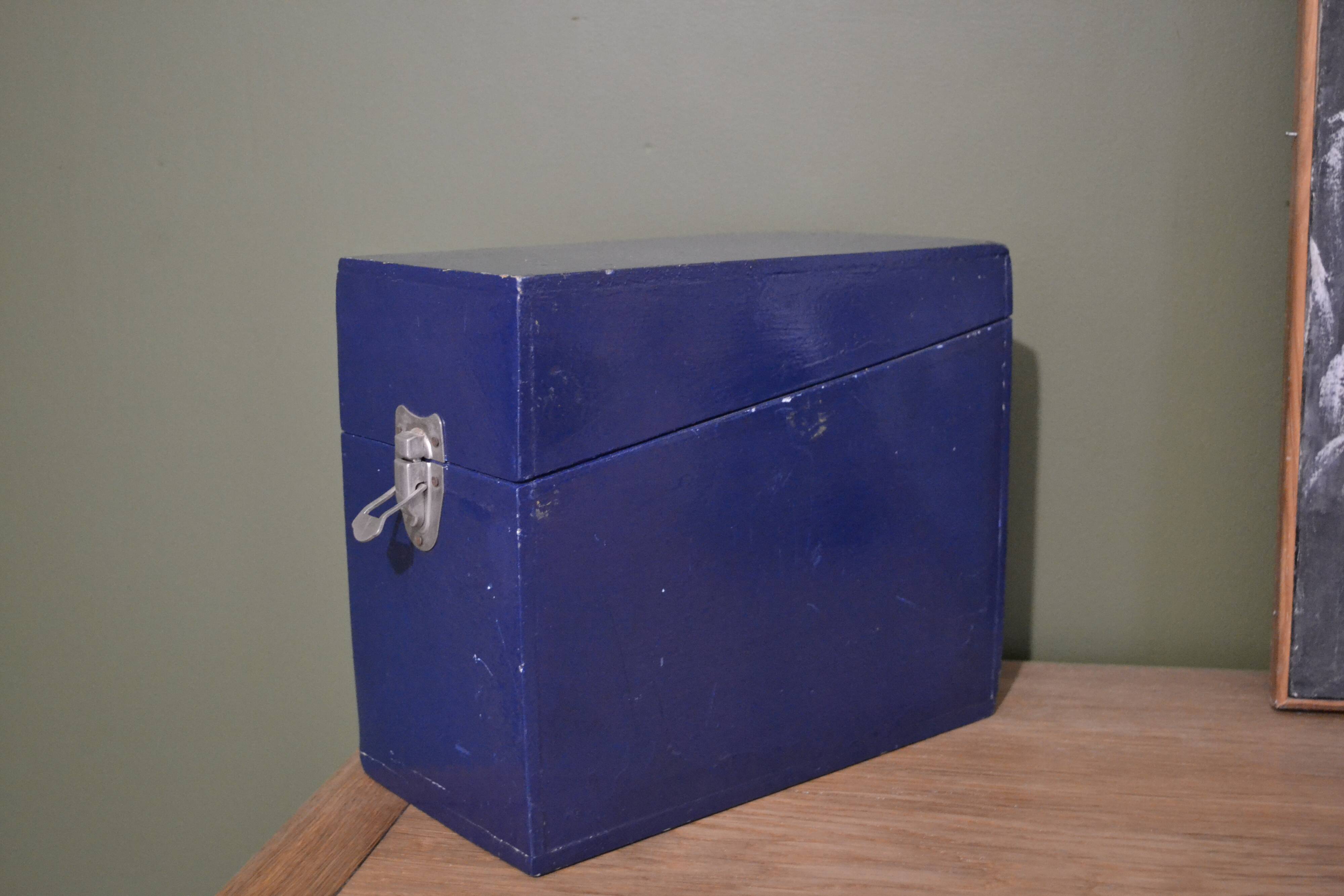 Blue painted wooden plug box