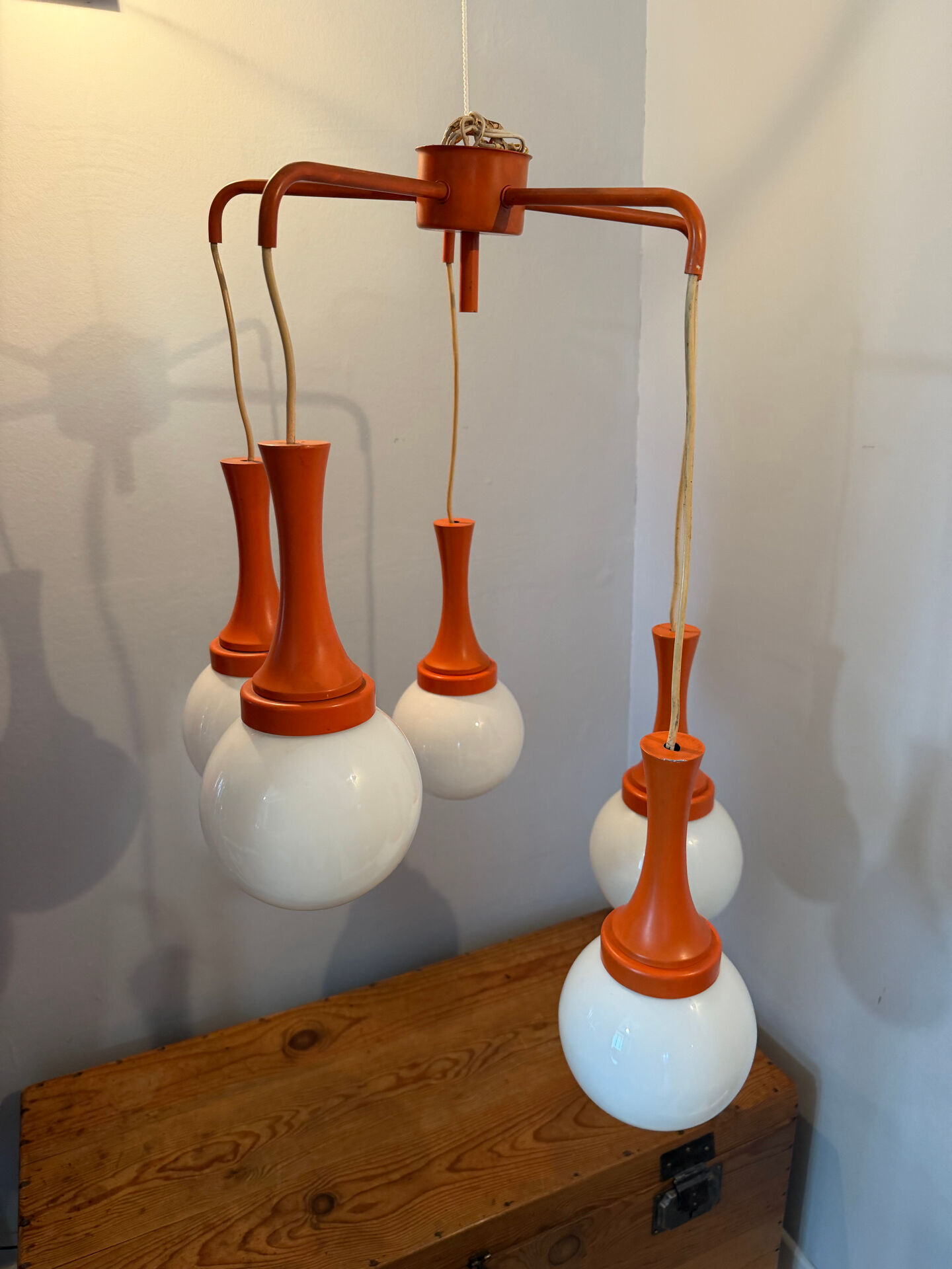 Suspension cascade design Space age orange vintage from the 70s.