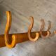 Curved wooden wall rack 4 hangers