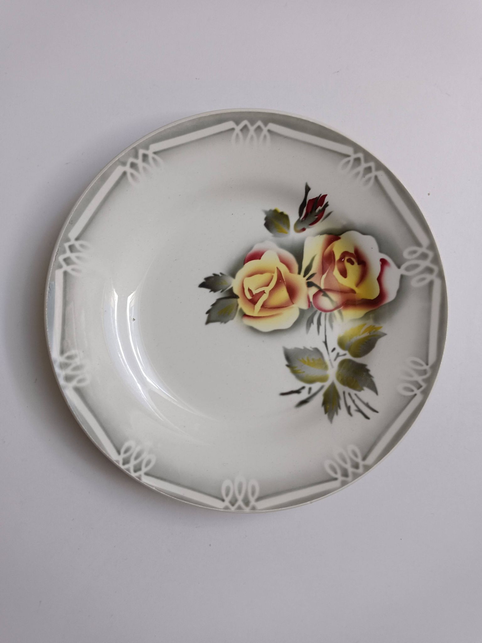 3 Digoin Sarreguemines Adèle plates in grey, yellow, and burgundy.