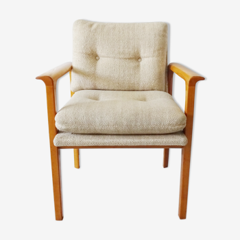 Lübke armchair in cherry wood with back and seat cushion in beige