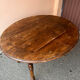 Round wooden folding table
