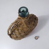 old bottle dressed in rattan vintage pilgrim gourd