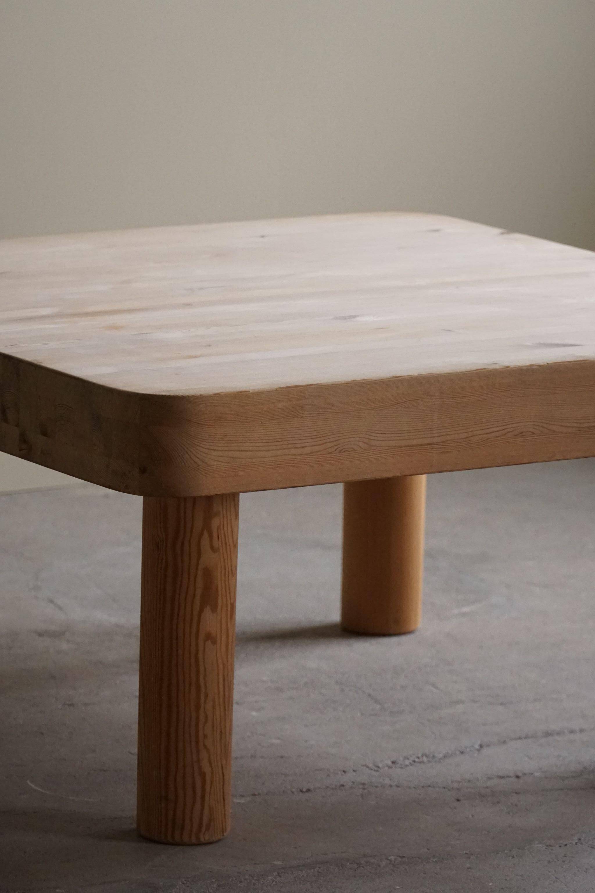 Square coffee table in solid pine with solid legs by Rainer Daumiller, mid-20th century brutalist style.