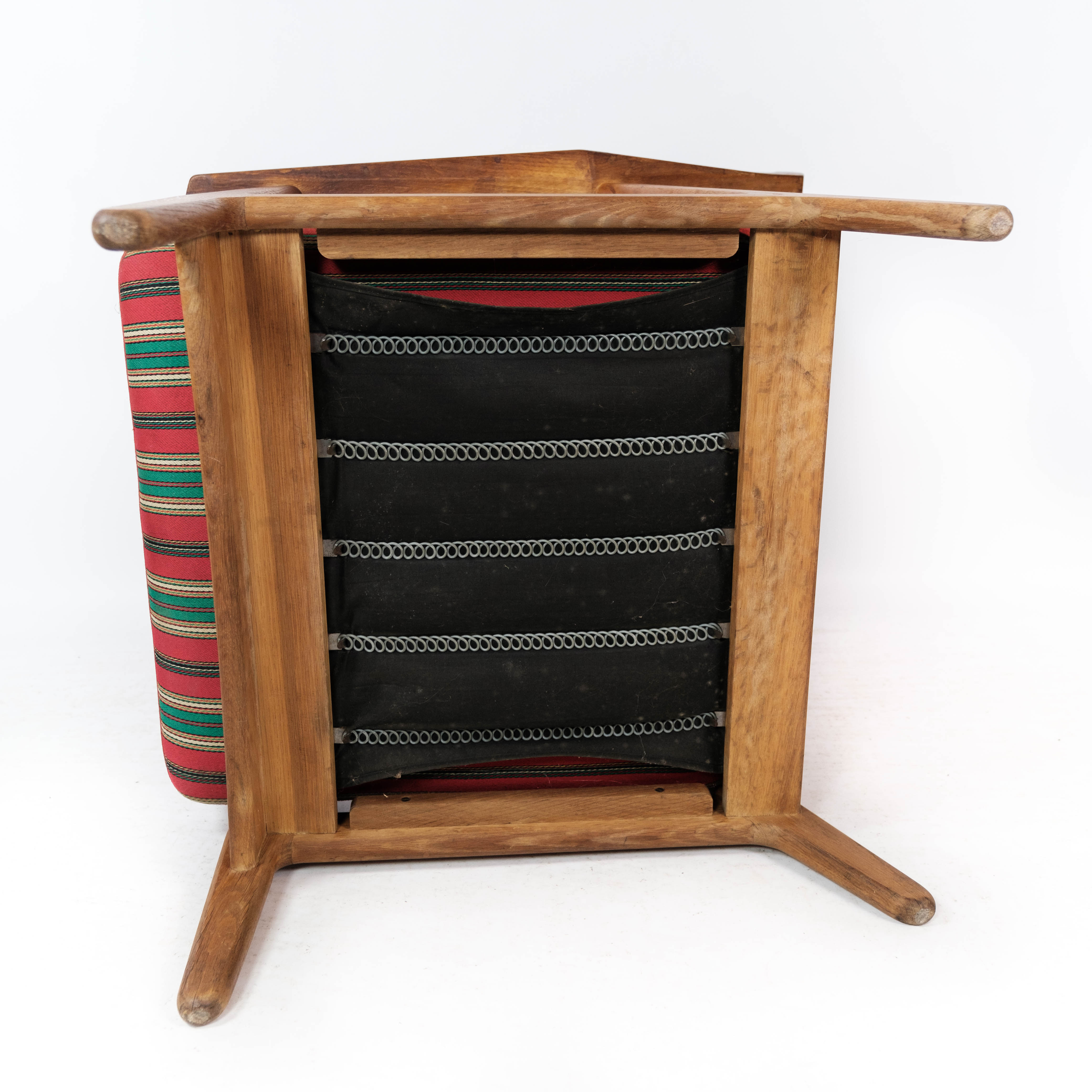 Armchair in oak and upholstered with red fabric, designed by H. Brockmann Pedersen, 1960s