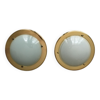 Pair ceiling lights or wall portholes.