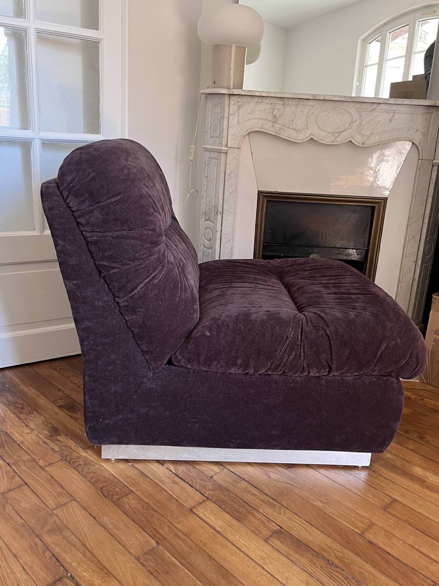 Vintage 1970s lounge chair in chocolate brown velvet with a chrome base.