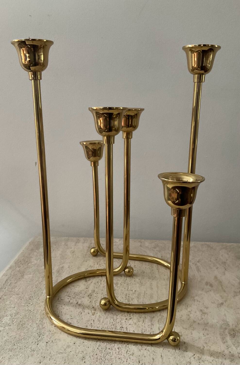 Duo of modernist brass candlesticks