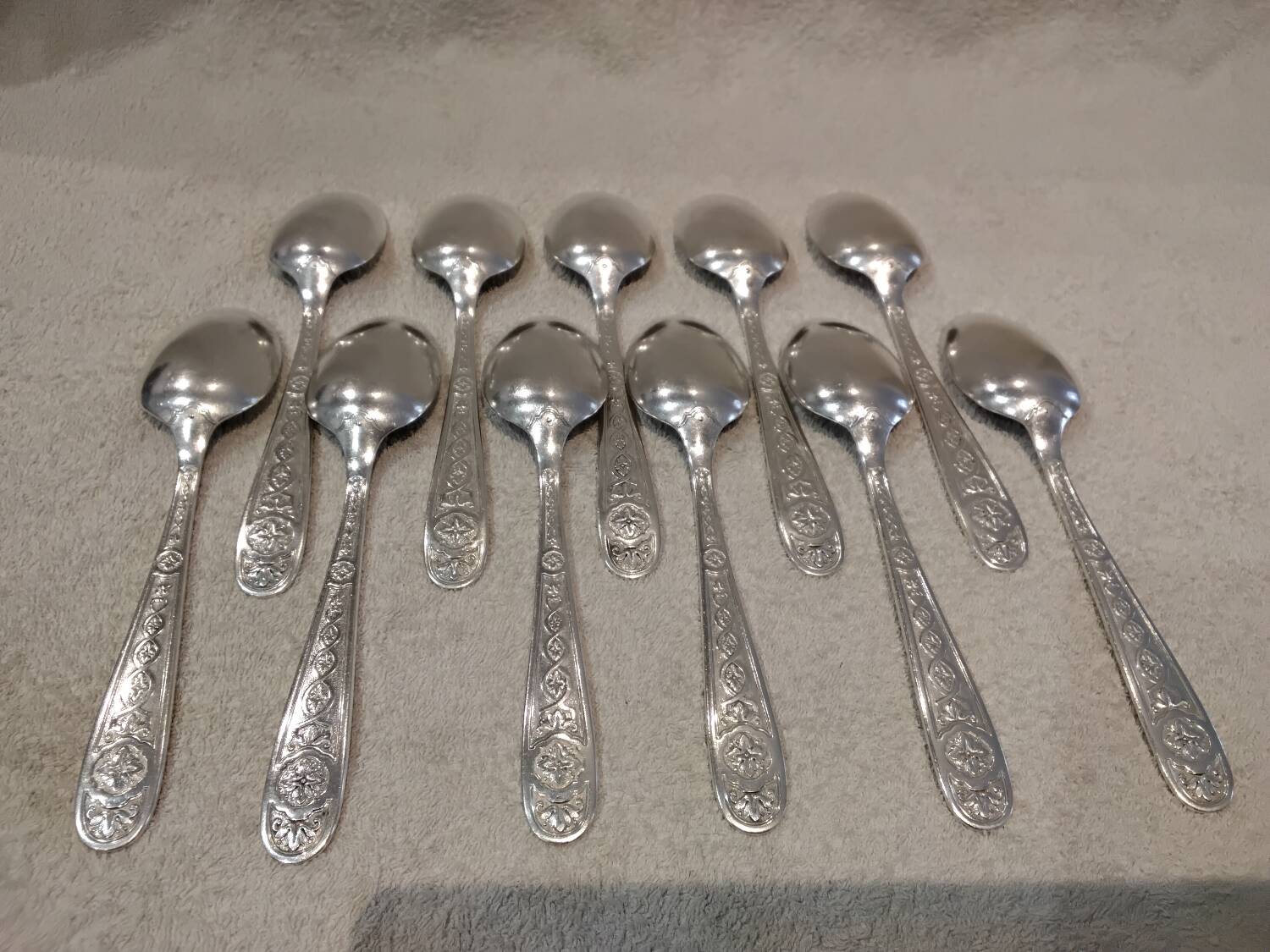 11 silver-plated soup spoons by Christofle Villeroy & Boch, striped