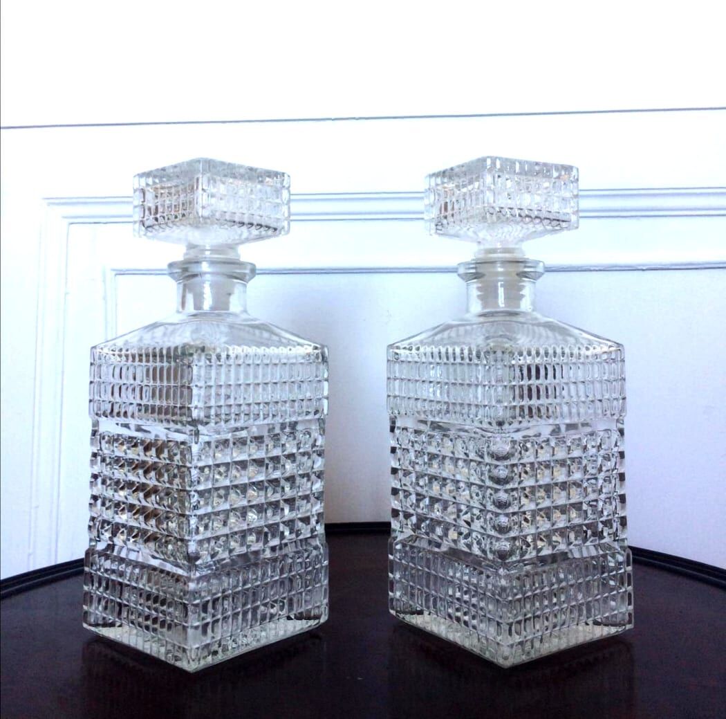 Pair of vintage diamond-cut whiskey decanters