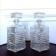 Pair of vintage diamond-cut whiskey decanters