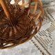 Wicker fruit bowl on a stand