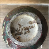 Small Dalpayrat vase shaped ball in polychrome glacured ceramic with relief decoration of a flower signed under the base