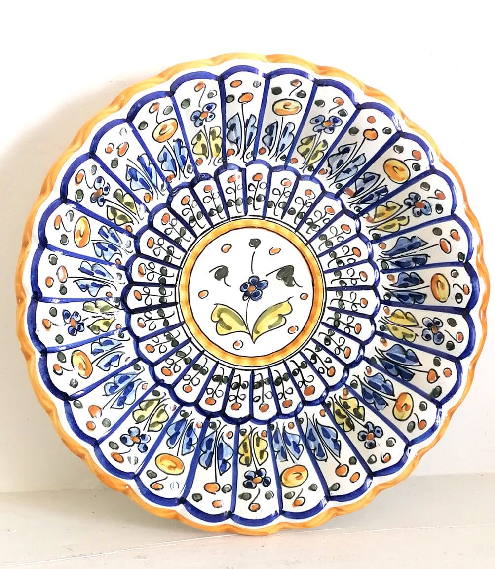 Godronné dish in earthenware signed 1951