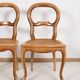 Paire de chaises cannées, en bois