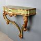 19th-century carved wooden drop-leaf console.