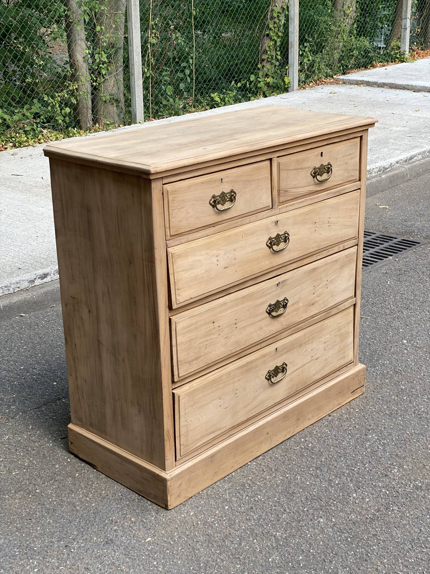 English stripped commode made of solid raw wood from the 19th century.