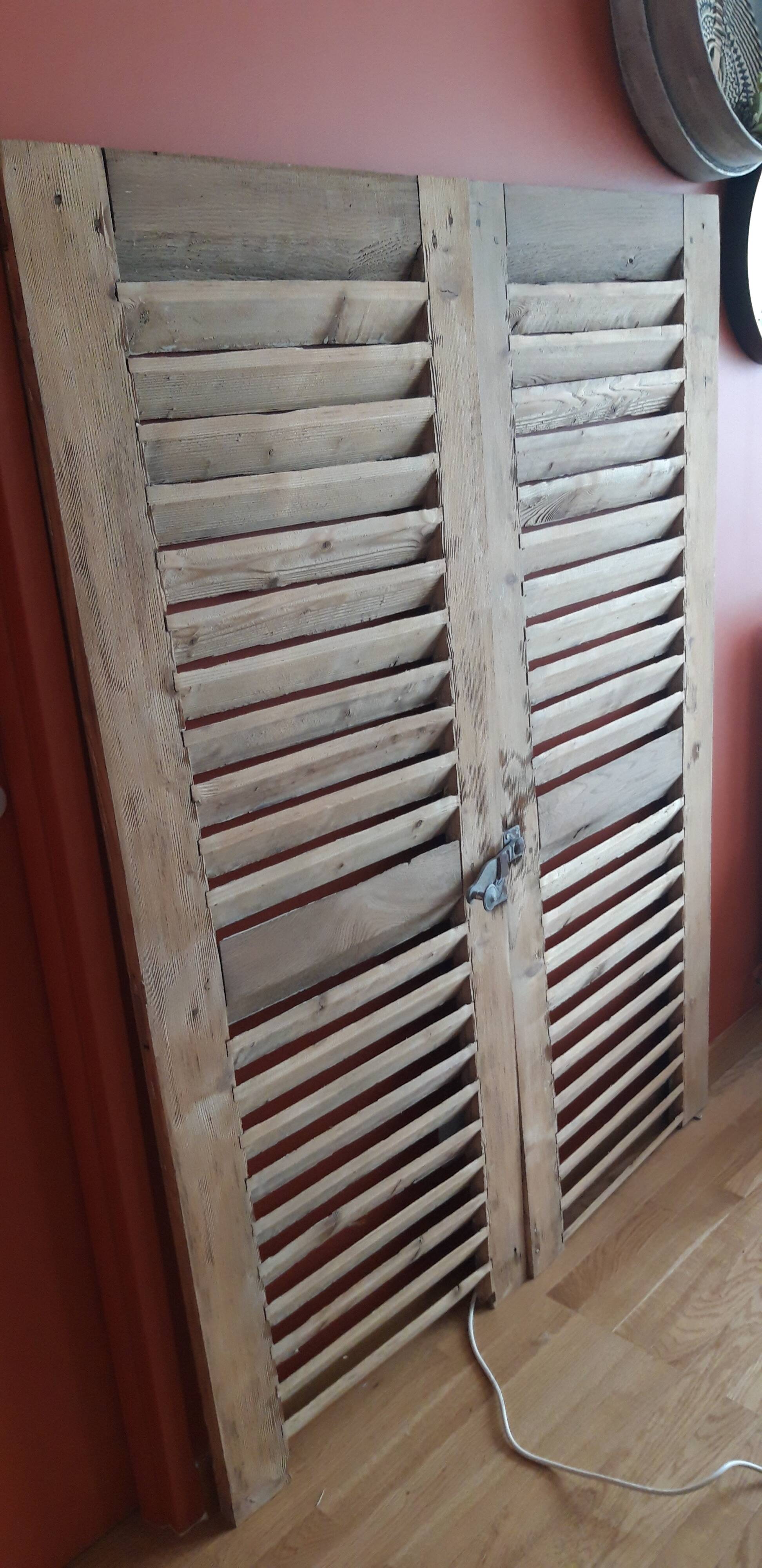 Pair of old unwrapped shutters