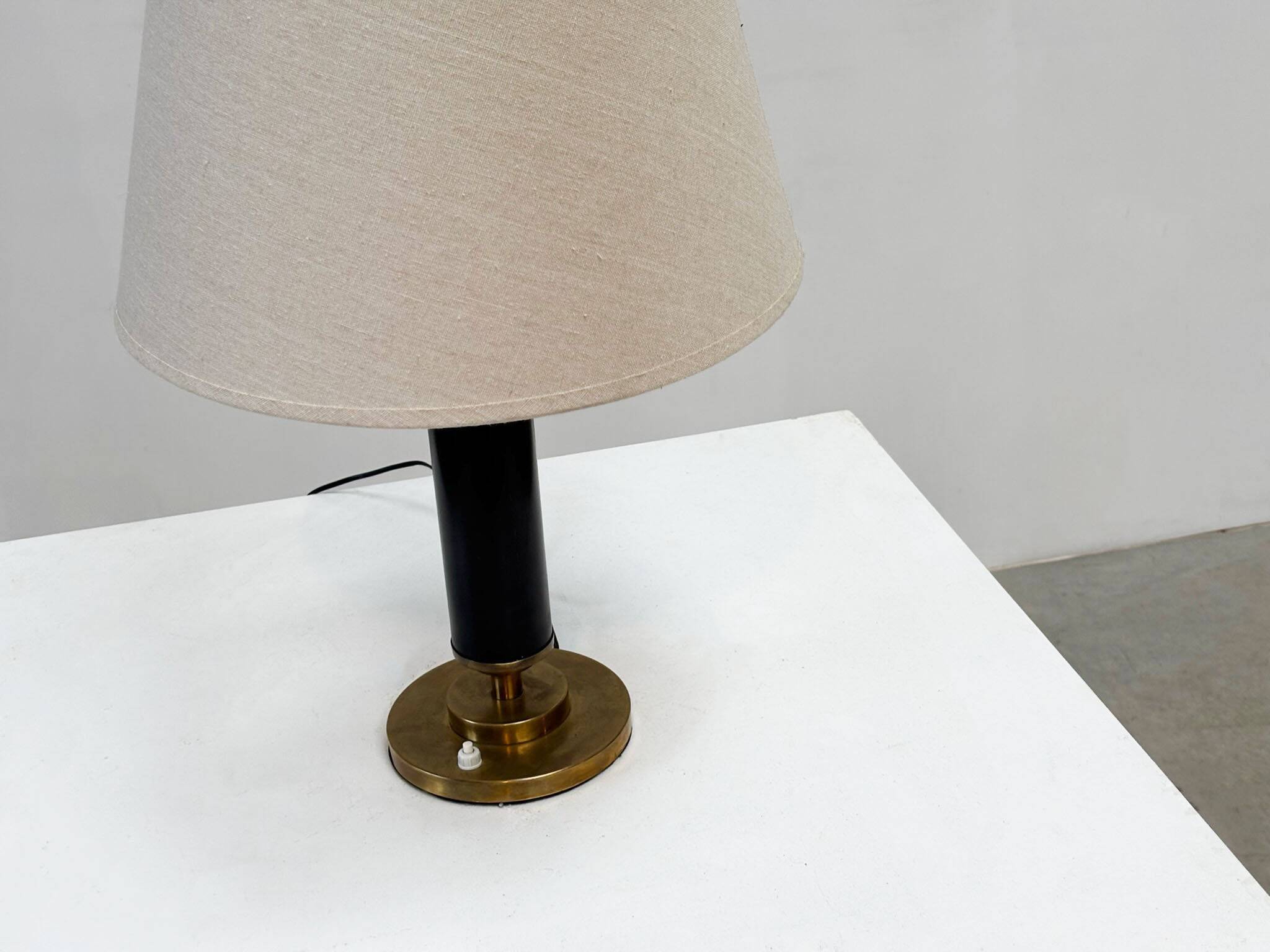 1960s brass and leather French table lamp