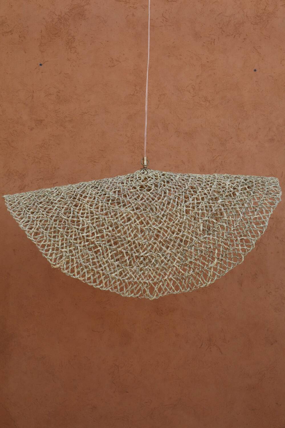 Handmade wicker hanging basket with brass finish