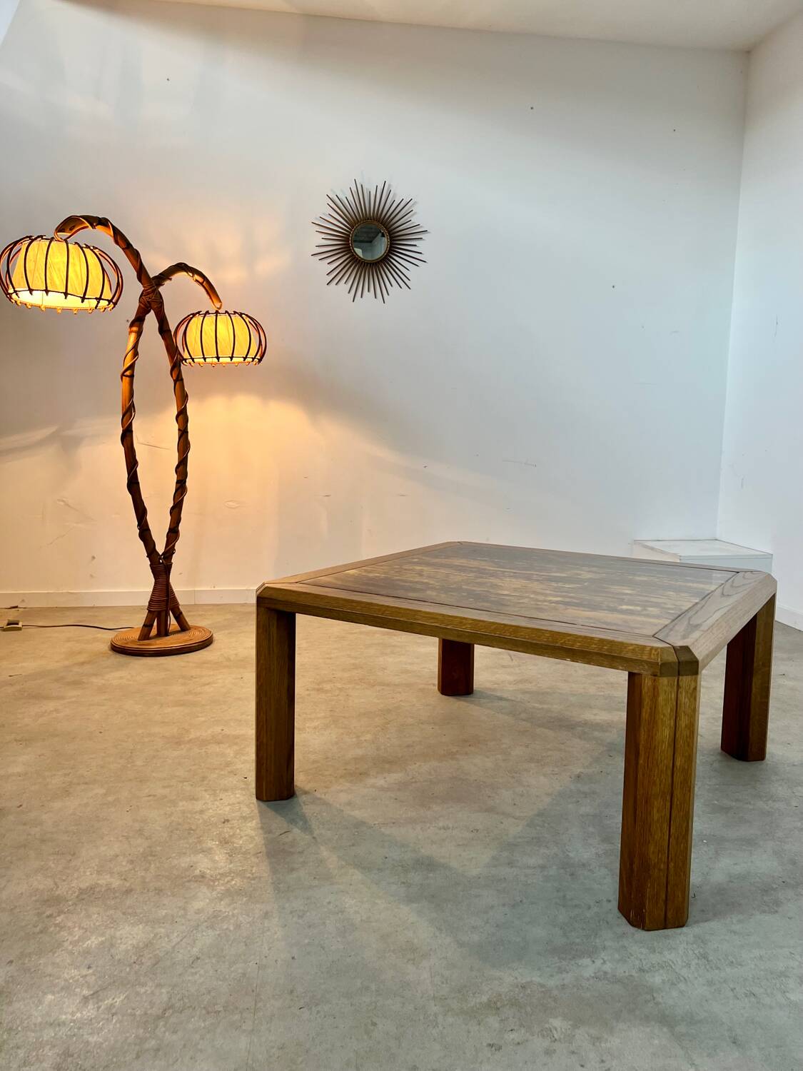 Old coffee table with golden marble top, 70s design, vintage wooden feet