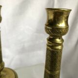 Pair of bronze and brass candlesticks