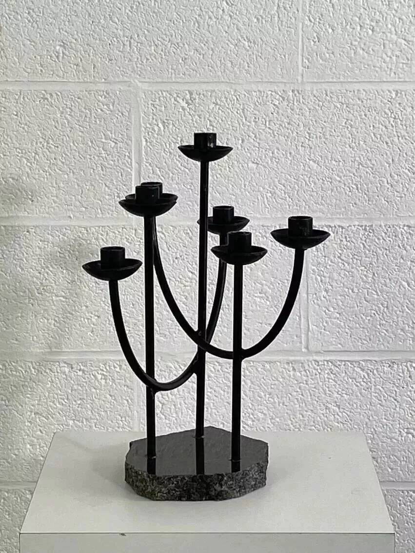 Metal candle holder and black quartz base