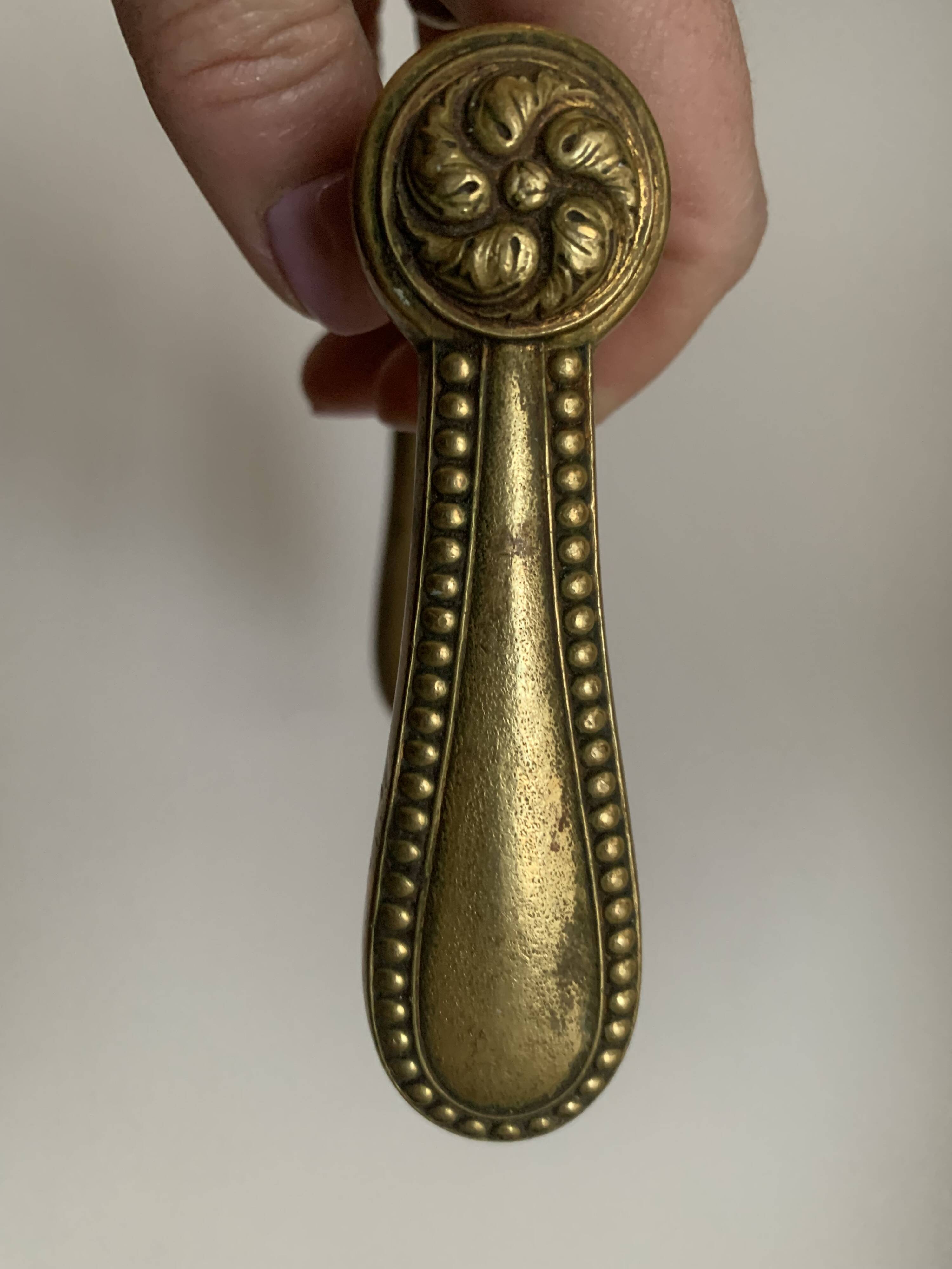 Old brass door handles