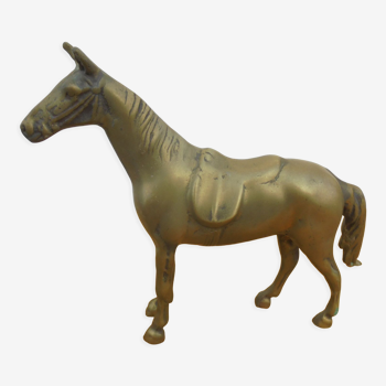 Brass saddled horse