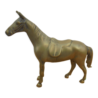 Brass saddled horse