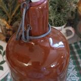 Bouteille ancienne en grès vernissé