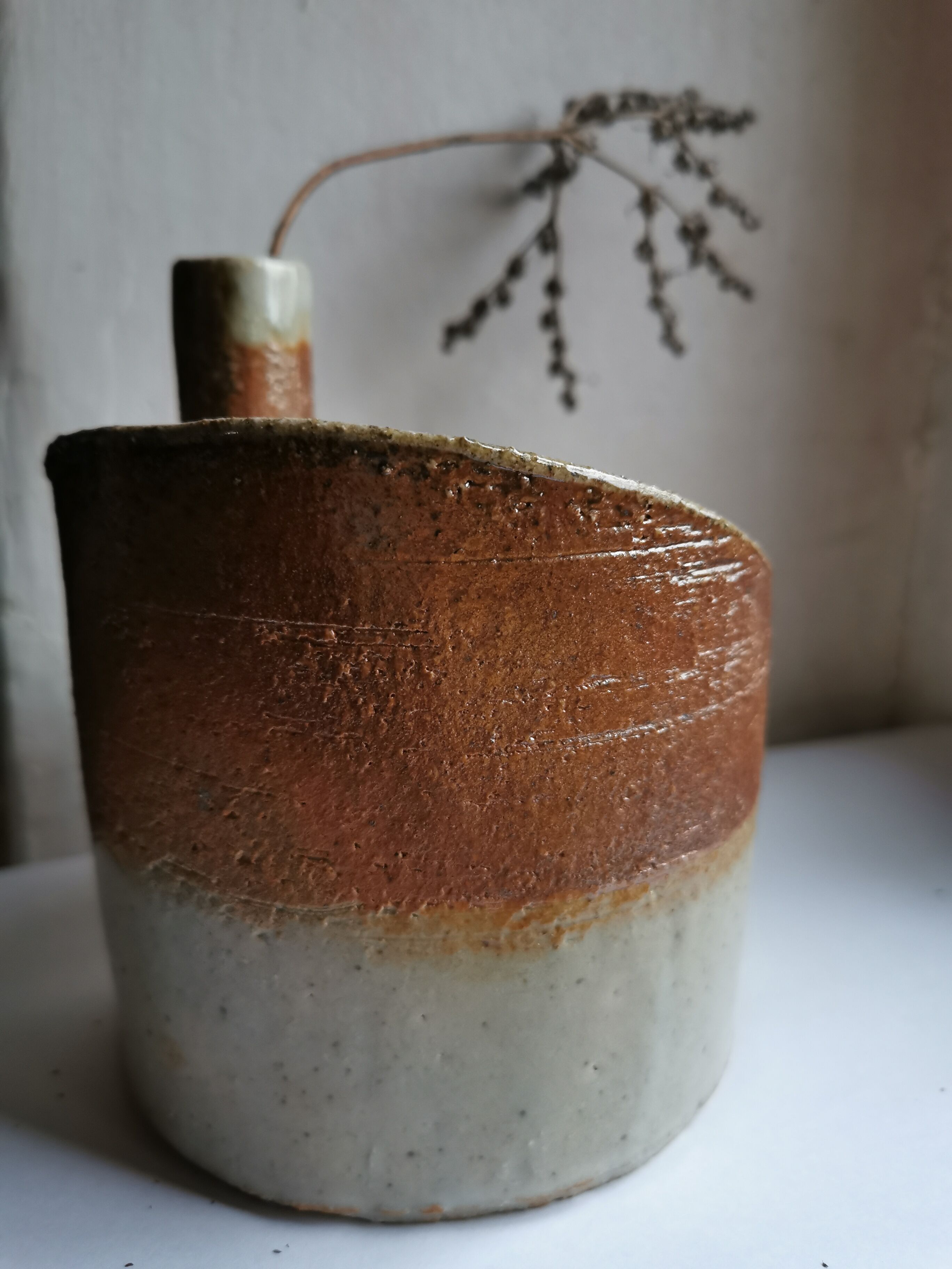 Vase in sandstone, free form, signed