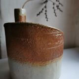 Vase in sandstone, free form, signed
