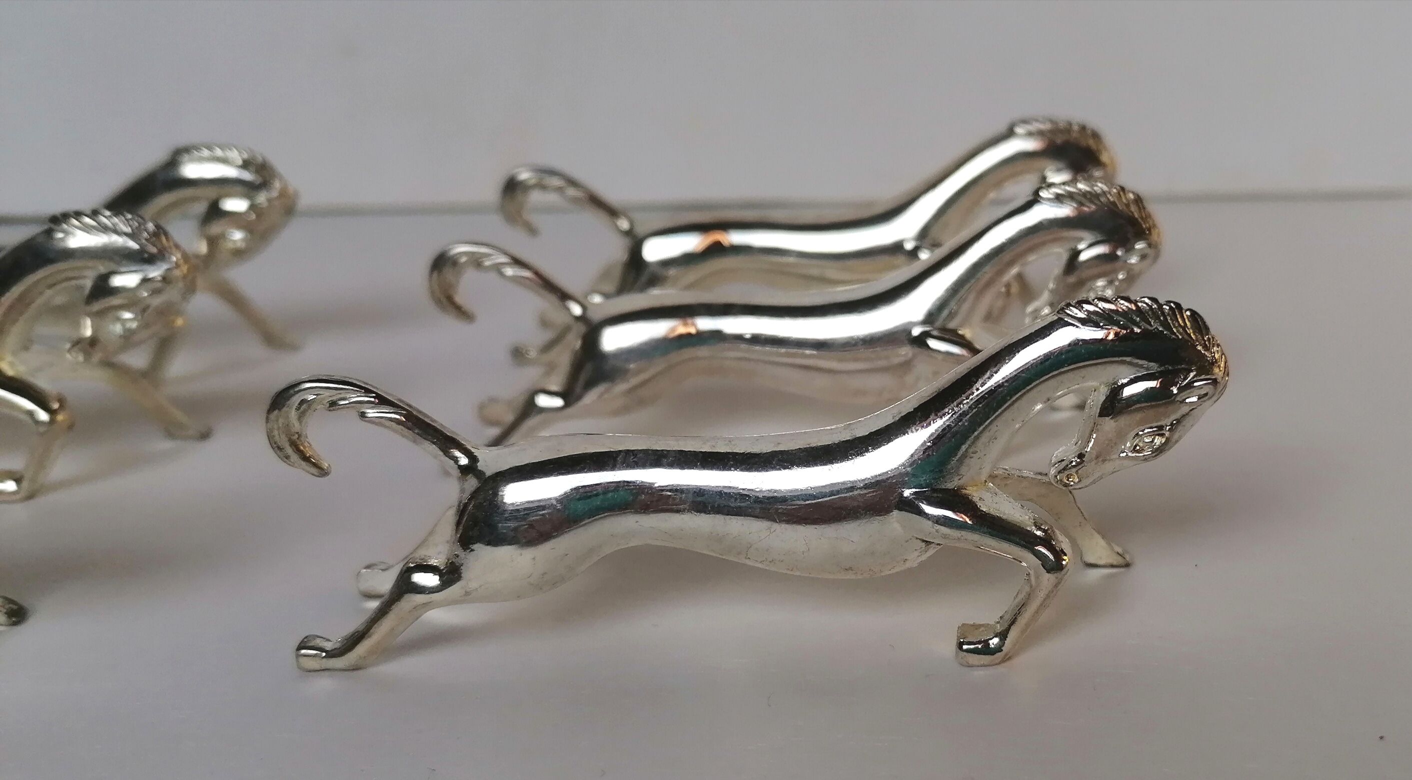 6 porte-couteaux métal argenté forme cheval