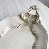 Tray, old dish with handles and relief patterns.