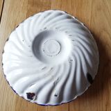 Enamelled tin candlestick